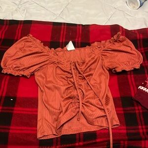 Cropped off the shoulder woman’s middle shirt